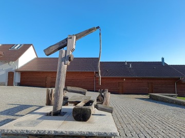 Dřevěná pumpa.