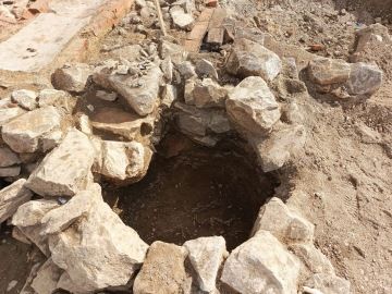 Odhalená historická studna.